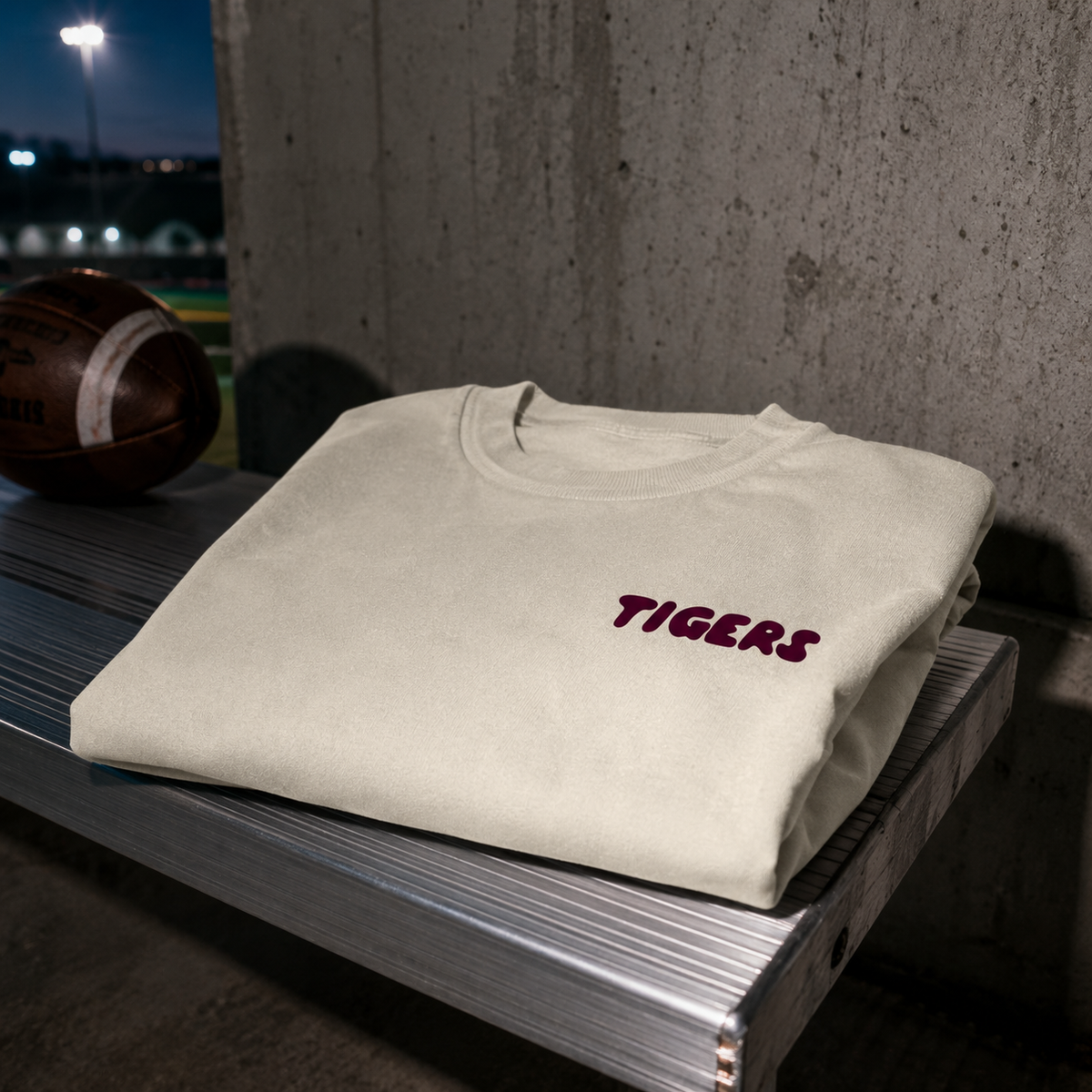 Slayground Drop 004 cream Tigers oversized streetwear tee on stadium bench