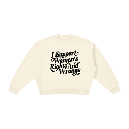 An off-white crewneck sweatshirt with the text 'I Support Women's Rights And Wrongs' printed in a black stylized font on the chest, displayed on a solid white background.