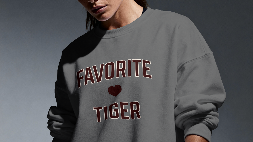 Gray oversized sweatshirt with 'FAVORITE TIGER' and a red heart graphic on the front.