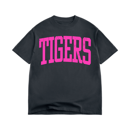 Vintage black oversized t-shirt with bold pink TIGERS text on front, streetwear style