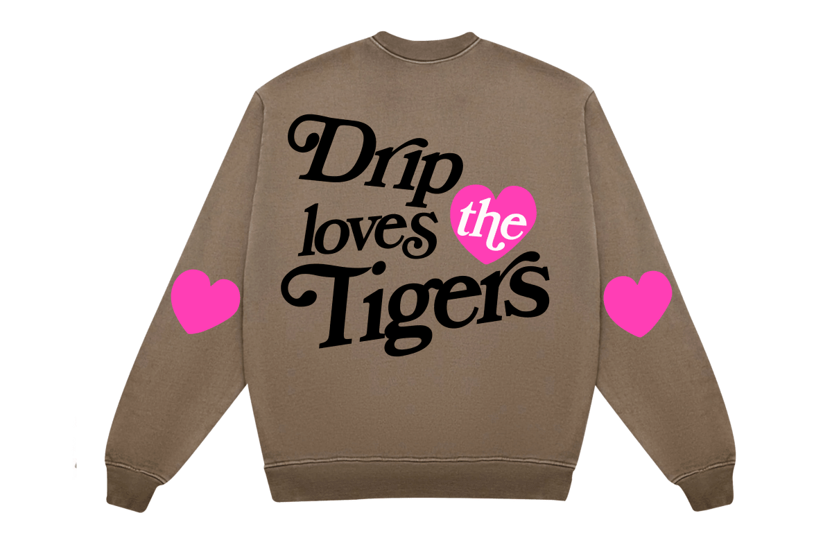 Brown oversized sweatshirt with 'Drip loves the Tigers' text and pink heart graphics on back and sleeves
