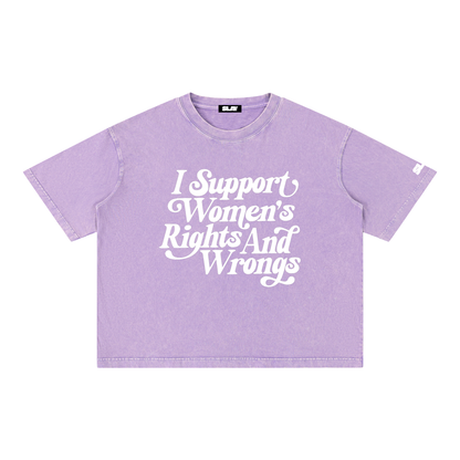 A light purple short-sleeve t-shirt with white text reading 'I Support Women's Rights And Wrongs' across the front, displayed flat against a solid white background.
